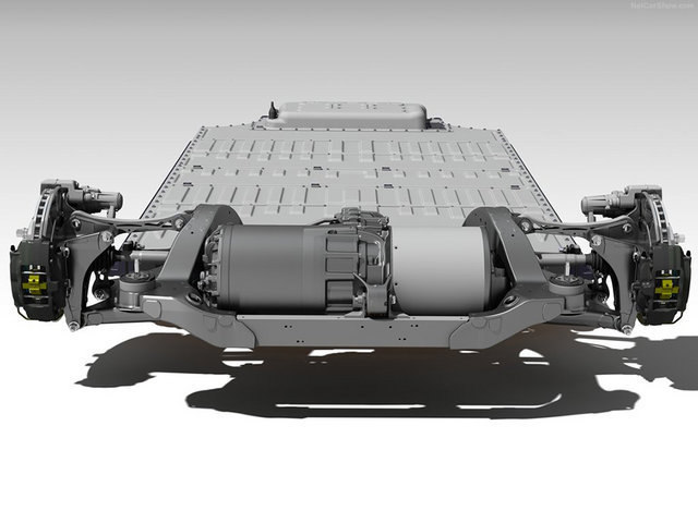 特斯拉的底盘上布满了电池组,通过电动机的动力传递来驱动车轮.
