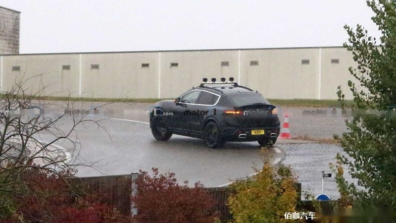 2022-porsche-macan-electric-first-spy-photo-rear-three-quarters.jpg