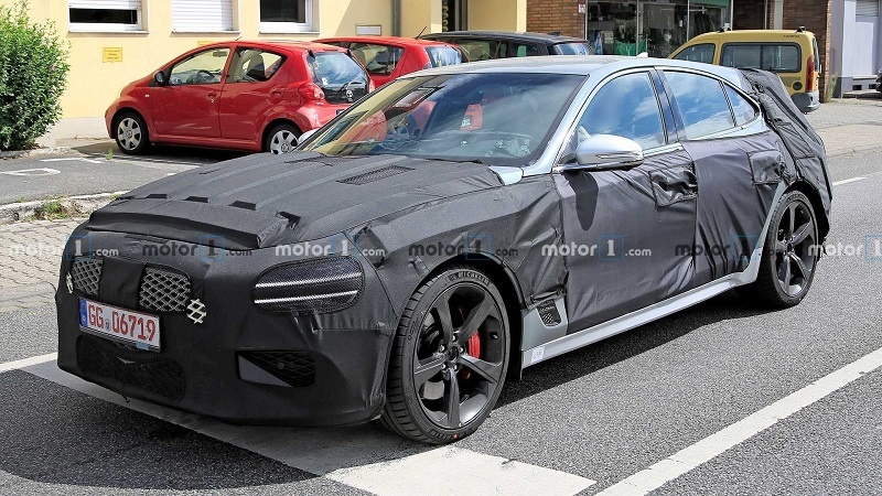 genesis-g70-shooting-brake-wagon-spied-front-camo-view.jpg