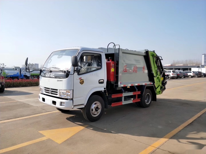 东风多利卡6方压缩式垃圾车 国五后挂桶式垃圾车图片
