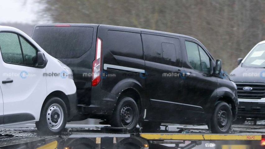 next-gen-ford-transit-custom-first-spy-photo-rear-three-quarters (1).jpg