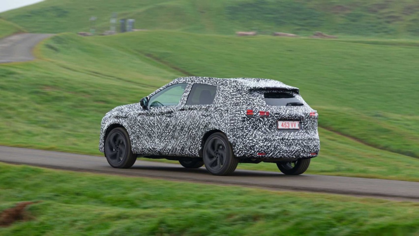 2021-nissan-qashqai-teaser-image-camouflaged-prototype.jpg