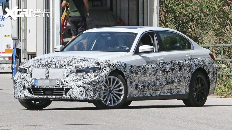 bmw-3-series-electric-spy-photos-front-3-4.jpg