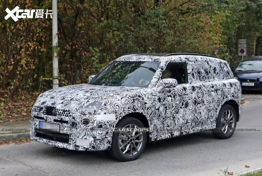 https://www.carscoops.com/2021/10/2024-mini-countryman-makes-spy-debut-revealing-bigger-footprint/